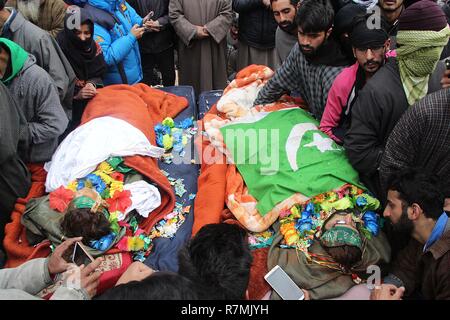 Hajin, Kashmir. 10th December, 2018. People offer funeral prayers for teenage militants 14 year old Mudasir Rashid and 17 year old Sakib Bilal in Hajin area of north Kashmir some 35 kilometers from Srinagar the summer capital of Indian controlled Kashmir on December 10, 2018. Fourteen year old was among the three militants killed in 18-hour long gun-battle in Mujigund area on the Srinagar outskirts on December 09, 2018. Credit: Faisal Khan/Pacific Press/Alamy Live News