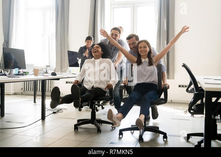 Happy multiracial colleagues group having fun together in office Stock Photo