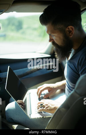 Bearded man. earnings on Internet. job search. Mature hipster with beard. being late. rush hour. lack of time. deadline. Male barber care. brutal hipster with moustache. Responding on business e-mail Stock Photo