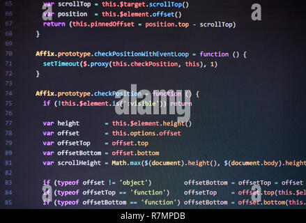 Colorful programming php and html source code on a monitor written by a young programmer. Stock Photo
