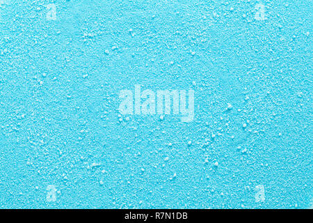 Blue Granulated Candy Sugar Textured Background Close Up. Stock Photo