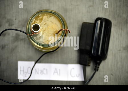 Electrolysis project step by step, 6V dc power supply Stock Photo