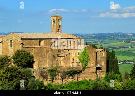 Old church in Montalcino town, Val d'Orcia, Tuscany, Italy. The town takes its name from a variety of oak tree that once covered the terrain. Stock Photo