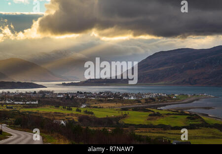 Shafts of sunlight through clouds at the east end of Loch Broom, NW Highlands of Scotland. Viewed from the A835 road above Ullapool. Stock Photo