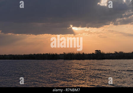 Sunset at Chobe river between Namibia, Botswana Stock Photo