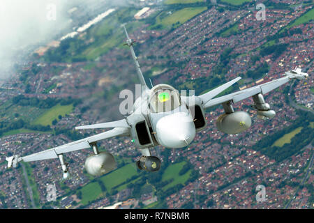 Swedish Air Force Saab JAS 39 Gripen a light single-engine multirole fighter aircraft manufactured by the Swedish aerospace company Saab. Photographed Stock Photo