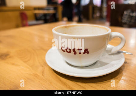 A man proved a large cup of Costa coffee fits into a regular cup