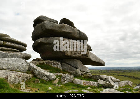 Rock stack, wind and rain eroded granite rock, balanced on the Tor near Minion on Bodmin Moor Cornwall.UK Stock Photo