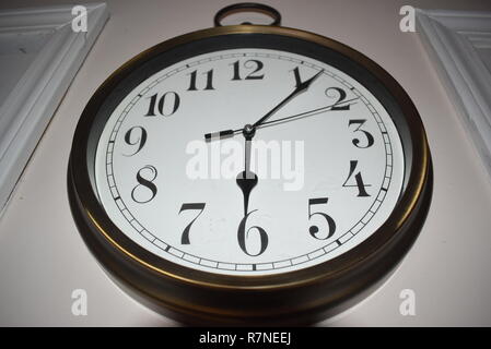 Clock on a wall Stock Photo