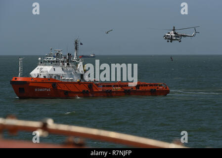 Fire fighting training exercises on the oil rig Lukoil Filanovsky at the Caspian sea, Russia. Stock Photo