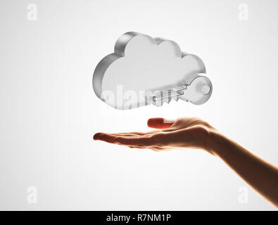 Cloud computing concept with glass symbol shown in hand Stock Photo