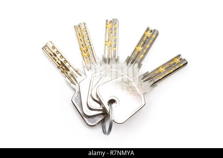 Five security keys on ring, top view, isolated on white Stock Photo