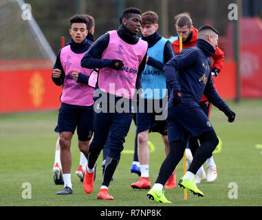 Manchester United's Paul Pogba (centre) during the training session at the AON Training Complex, Manchester. Stock Photo