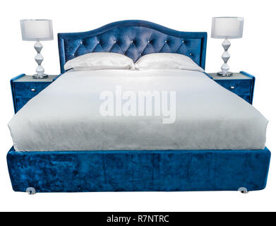 Luxury white blue modern bed furniture with patterned cover with velour upholstery headboard . Soft cozy fabric bedclothes. Classic modern furniture o Stock Photo
