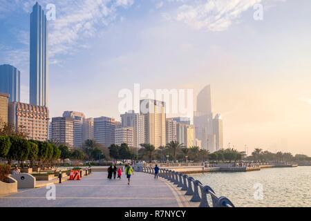 United Arab Emirates, Abu Dhabi, the Corniche and the skyscrapers of Al Markaziyah business district in the background Stock Photo