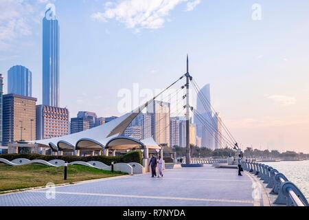 United Arab Emirates, Abu Dhabi, the Corniche and the skyscrapers of Al Markaziyah business district in the background Stock Photo