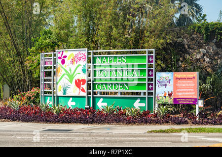 Naples, USA - April 30, 2018: Downtown street road with Botanical Garden welcome entrance sign, summer camp registration in Florida Stock Photo