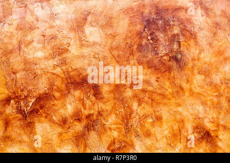 textured decorative plaster walls on the street Stock Photo