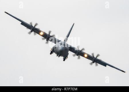 A C-130J Super Hercules approaches the runway at Yokota Air Base, Japan, March 29, 2017. This is the second C-130J delivered from Lockheed Martin, less than a month after the first was delivered March 6th. Yokota serves as the primary Western Pacific airlift hub for U.S. Air Force peacetime and contingency operations. Missions included tactical air land, airdrop, aeromedical evacuation, special operations and distinguished visitor airlift. Stock Photo