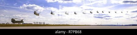 A CH-47 Chinook helicopter with 3-10 General Support Aviation Battalion, 10th Combat Aviation Brigade, takes off from Katterbach Army Airfield, Germany, on March 20. The flight was part of a progression flight that is needed for crews to prove proficiency in key competencies. Stock Photo