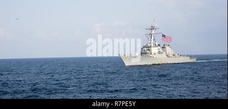 7TH FLEET AREA OF OPERATIONS (March 22, 2017) The  Arleigh Burke-class guided-missile destroyer USS Stethen (DDG 63) transits waters east of the Korean Peninsula during a photo exercise including the United States Navy and the Republic of Korea Navy during Exercise Foal Eagle. The Carl Vinson Carrier Strike Group is on a regularly scheduled Western Pacific deployment as part of the U.S. Pacific Fleet-led initiative to extend the command and control functions of U.S. 3rd Fleet. U.S. Navy aircraft carrier strike groups have patrolled the Indo-Asia-Pacific regularly and routine Stock Photo