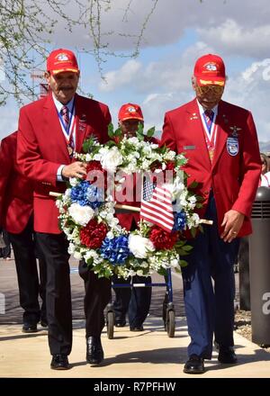 (Ret.) Tech. Sgt. Rudolf Silas, and (Ret.) Lt. Col. Robert Ashby, two of the original Tuskegee Airman, carry a wreath Mar. 23 during the fourth annual Commemoration Day for the Tuskegee Airmen in Arizona at Luke Air Force Base, Ariz. Stock Photo