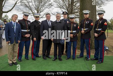 Marines from 2nd Battalion, 8th Marine Regiment and members of the funeral detail pose for a photo with Secretary of Defense James Mattis at the funeral of Harry K. Tye at Arlington National Cemetery, Mar. 28, 2017. Pvt. Tye was killed on Nov. 20, 1943 during the Battle of Tarawa. His remains were recovered by History Flight from Cemetery 27 on Tarawa and interned on U.S. soil. Stock Photo