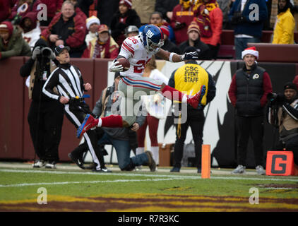 New York Giants running back Saquon Barkley (26) celebrates as he scores after a 78 yard run in the second quarter against the Washington Redskins at FedEx Field in Landover, Maryland on Sunday, December 9, 2018. Credit: Ron Sachs/CNP (RESTRICTION: NO New York or New Jersey Newspapers or newspapers within a 75 mile radius of New York City) | usage worldwide Stock Photo