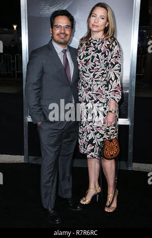 WESTWOOD, LOS ANGELES, CA, USA - DECEMBER 10: Actor Michael Pena and wife Brie Shaffer arrive at the Los Angeles Premiere of Warner Bros. Pictures' 'The Mule' held at the Regency Village Theatre on December 10, 2018 in Westwood, Los Angeles, California, United States. (Photo by Image Press Agency) Stock Photo