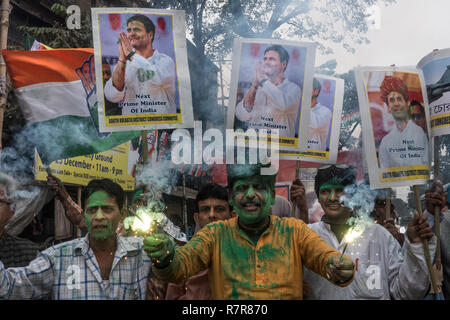 Kolkata, India. 11th Dec, 2018. Supporters of the Indian National Congress (INC) celebrate election results in Kolkata, India, Dec. 11, 2018. After over 10 hours of continuous counting of votes in five states that went to polls recently, India's main opposition party the INC seemed comfortably positioned on Tuesday to grab three major states -- Madhya Pradesh, Chhattisgarh and Rajasthan, from the main ruling Bharatiya Janata Party (BJP). Credit: Tumpa Mondal/Xinhua/Alamy Live News Stock Photo