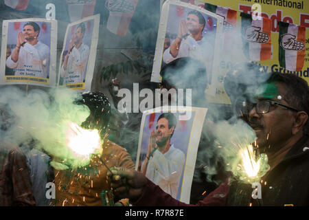 Kolkata, India. 11th Dec, 2018. Supporters of the Indian National Congress (INC) celebrate election results in Kolkata, India, Dec. 11, 2018. After over 10 hours of continuous counting of votes in five states that went to polls recently, India's main opposition party the INC seemed comfortably positioned on Tuesday to grab three major states -- Madhya Pradesh, Chhattisgarh and Rajasthan, from the main ruling Bharatiya Janata Party (BJP). Credit: Tumpa Mondal/Xinhua/Alamy Live News Stock Photo