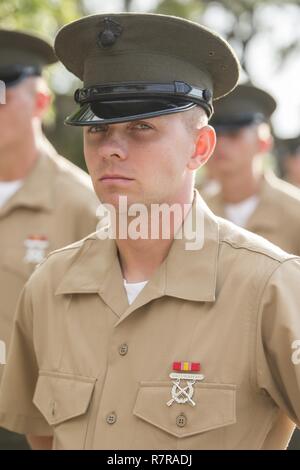 Pfc. Nicholas L. Elswick, with Platoon 3018, Mike Company, 3rd Recruit Training Battalion, earned the company's highest physical fitness and combat fitness score. Elswick, a native of Chardon, Ohio, earned a score of 600 out of 600 points and graduated boot camp March 31, 2017. Stock Photo