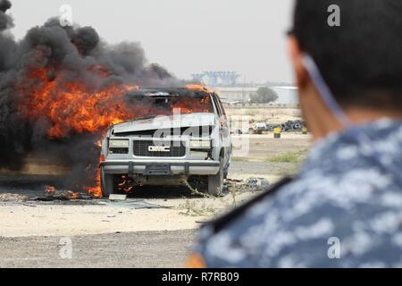 Civilian and military personnel from Kuwait, Saudi Arabia and the U.S. conducted counterterrorism drills as part of Eagle Resolve 2017 near Kuwait International Airport, March 28, 2017. Urban warfare specialists conducted search and rescue operations and responded to a mock vehicle explosion (pictured). Since 1999, Eagle Resolve - involving over 1,000 U.S. military personnel - has become the premier multi-national exercise between U.S. and Gulf Cooperation Council nations to collectively address the regional challenges in a low-risk setting. Stock Photo