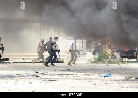 Civilian and military personnel from Kuwait, Saudi Arabia and the U.S. conducted counterterrorism drills as part of Eagle Resolve 2017 near Kuwait International Airport, March 28, 2017. Urban warfare specialists conducted search and rescue operations and responded to a mock vehicle explosion. Since 1999, Eagle Resolve - involving over 1,000 U.S. military personnel - has become the premier multi-national exercise between U.S. and Gulf Cooperation Council nations to collectively address the regional challenges in a low-risk setting. Stock Photo