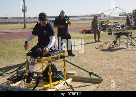 U.S. Army veteran Jarred Vaina trains for the sitting dicus event for the Warrior Care and Transition's Army Trials as Fort Bliss Texas, March 31, 2017. About 80 wounded, ill and injured active-duty Soldiers and veterans are competing in eight different sports 2-6 April for the opportunity to represent Team Army at the 2017 Department of Defense Warrior Games. Stock Photo