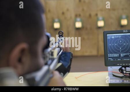 U.S. Army Sgt. Christopher McGinnis, Bethesda, Md., trains for event for the Warrior Care and Transition's Army Trials at Fort Bliss Texas, March 31, 2017. About 80 wounded, ill and injured active duty Soldiers and veterans are competing in eight different sports 2-6 April for the opportunity to represent Team Army at the 2017 Department of Defense Warrior Games. Stock Photo