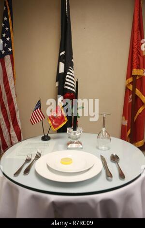 https://l450v.alamy.com/450v/r7rc09/the-powmia-table-sits-empty-per-us-military-tradition-at-the-final-dinner-for-mess-hall-521-at-camp-lejeune-nc-march-31-2017-the-mess-hall-has-been-open-for-74-years-and-held-a-closing-ceremony-in-honor-of-the-mess-halls-contributions-to-camp-lejeune-the-table-honors-those-who-have-paid-the-ultimate-sacrifice-to-defend-americas-freedom-r7rc09.jpg