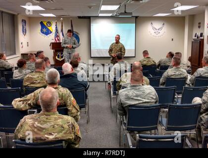 Maj. Gen. Timothy Orr, The Adjutant General of the Iowa National Guard, visits the Fort Dodge Army and Air National Guard facilities on Thursday, March 30, 2017. Lt. Col. Robin Hosch, Commander of the 133rd Test Squadron, briefs the general and staff about the current outlook of the squadron. (National Guard Stock Photo