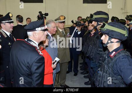 His Royal Highness, Prince Charles, Prince of Wales (center), Gen. Claudio Graziano, Italian Army Chief of Staff (rear) and Gen. Tullio Del Sette, Italian Carabinieri General Commander (front),  talk with Italian Carabiniere  student , during visit at Center of Excellence for Stability Police Units (CoESPU) Vicenza, Italy, April 1, 2017.