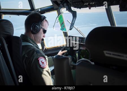 Capt. Nick Foreman, 815th Airlift Squadron pilot, flies a C-130J
