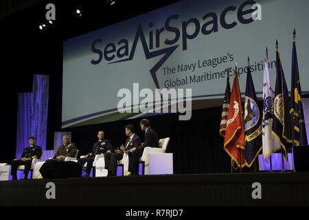 NATIONAL HARBOR, Md. (April 3, 2017) Vice Chief of Naval Operations (VCNO) Vice Adm. William Moran, left, joins a panel including the Assistant Commandant of the U.S. Marine Corps Gen. Glenn Walters, Vice Commandant of the U.S. Coast Guard Adm. Charles Michel, and Joel Szabat, executive director of Maritime Transportation, at the 2017 Sea, Air and Space Exposition to discuss a “Sea Services Update” regarding today's maritime enviroment. The annual event, founded in 1965, is the largest maritime exposition in the U.S. and brings together key military decision makers, U.S. defense industry repre Stock Photo