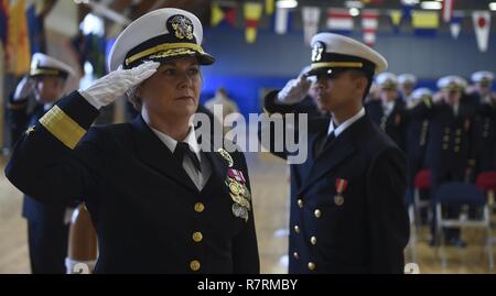 NEWPORT, R.I. (March 31, 2017) Rear Adm. Dawn Cutler, U.S. Navy chief of information, arrives as part of the official party and guest speaker for an officer candidate school graduation held at Kay Hall onboard Naval Station Newport, Rhode Island. Eighty-one officer candidates participated in the ceremony. Stock Photo