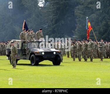 Commanding general of U.S. Army Forces Command (FORSCOM) GEN Robert Abrams (center), outgoing commanding general LTG Stephen Lanza (left), and incoming commanding general LTG Gary Volesky (right), inpsecting the troops accompanied by I Corps Chief of Staff Col. Joseph Wawro, Commander of Troops, during the I Corps change of command ceremony on Watkins Field, Joint Base Lewis-McChord, Washington, April 3, 2017. Stock Photo