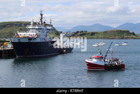 OBAN, SCOTLAND, 25 JULY 2018: View accross Oban Harbour towards the Isle of Mull. Oban is a town in the Western Highlands and the 'Gateway to the Isle Stock Photo