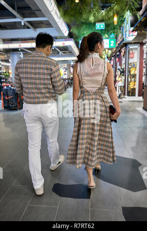 Matching clothes. Couple wearing matching coordinated clothing Stock Photo