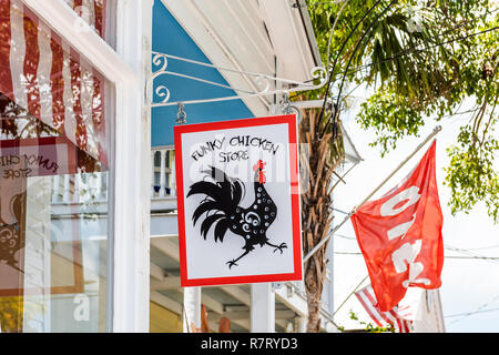 Key West, USA - May 1, 2018: Funky chicken store open sign closeup, architecture in Florida on travel, sunny day, nobody Stock Photo