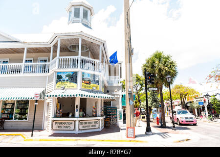 Key West, USA - May 1, 2018: Duval street architecture with tourist information center building, restaurants shops in Florida city travel, sunny day Stock Photo