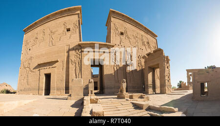 Hieroglypic carvings on wall at the entrance to ancient egyptian Temple of Isis in Philae Island Aswan Stock Photo