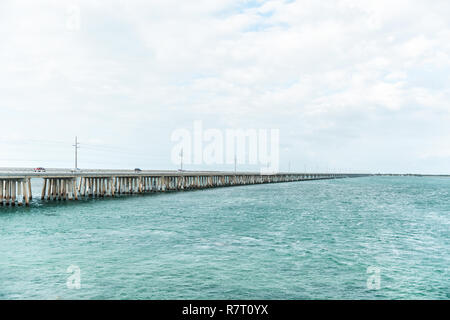 Seven Mile Bridge landscape of Florida Keys water atlantic ocean, cars on Overseas Highway on road Stock Photo