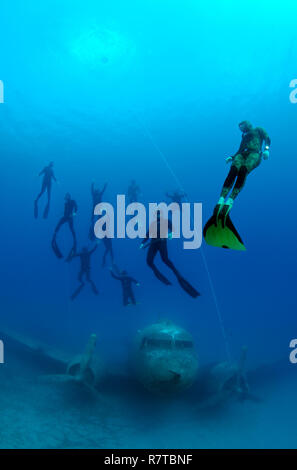 Freedivers at the Douglas Dakota plane wreck, near Kas, Lycia, Province of Antalya, Turkey Stock Photo
